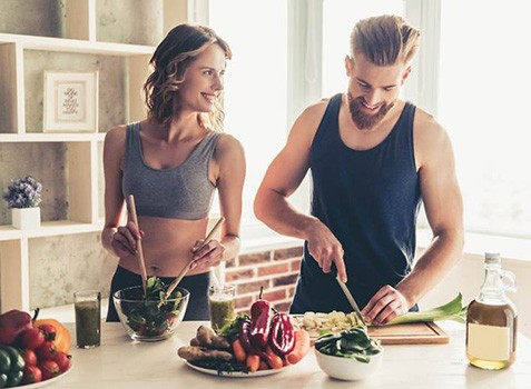 Young couple leading healthy lifestyle as part of detoxification plan