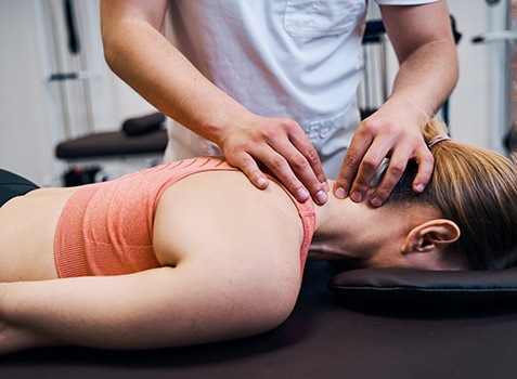 Female patient relaxing during massage therapy session
