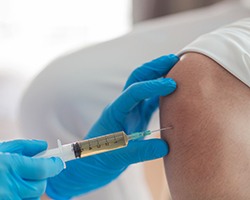 Patient receiving corticosteroid injection