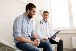 Doctor and patient having pleasant conversation